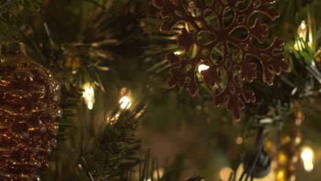 a close up slide on christmas tree decorations and ornaments, bokeh, selective focus, macro, right to left