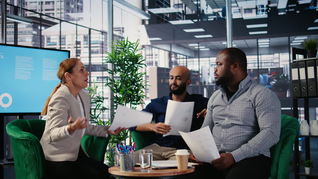 Vertical Video Group argument in a corporate office between diverse professionals