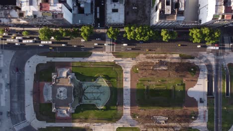 Aerial-top-down-Congress-Square-and-traffic-on-road-in-Buenos-Aires-during-rush-hour-time