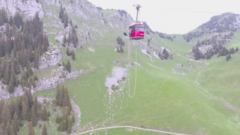 remarkable and crazy shot of a bungee jumper diving from a cable car in switzerland 1