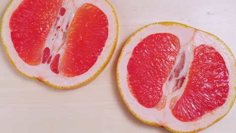 sliced ripe grapefruit rotation close-up