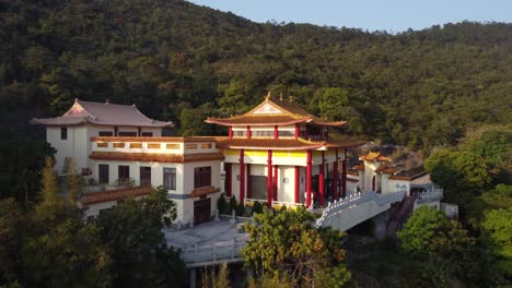 drone reveal of a  temple in hong kong