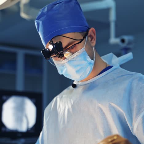 neurosurgeon with innovative equipment provides neurosurgery operation. medical team in operation room. selective focus