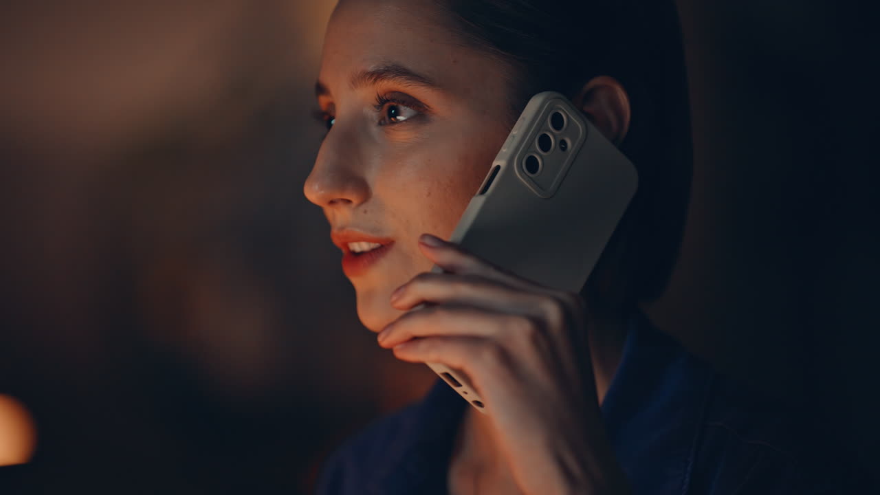 Calling woman employee ordering purchase in night office closeup. Smiling woman