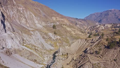 Maca-district-aerial-shot,-Peña-Blanca-tunnel,-Colca-Valley-route