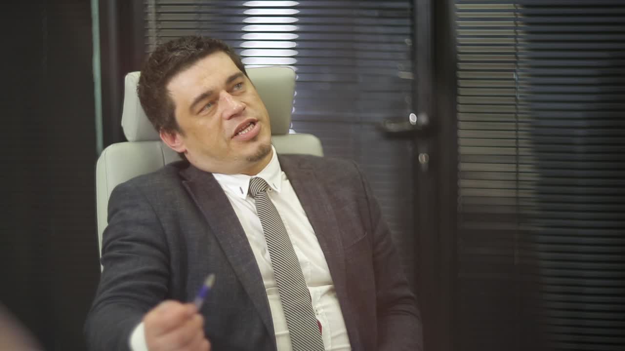 Business Team Plan Work In Office. Group of confident business partners planning work at meeting