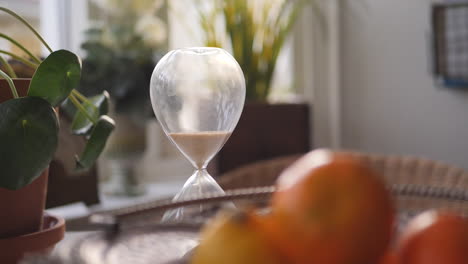 hourglass sand falling in slow motion