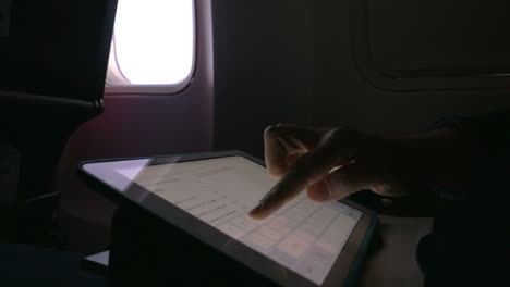 chatting on pad in the airplane