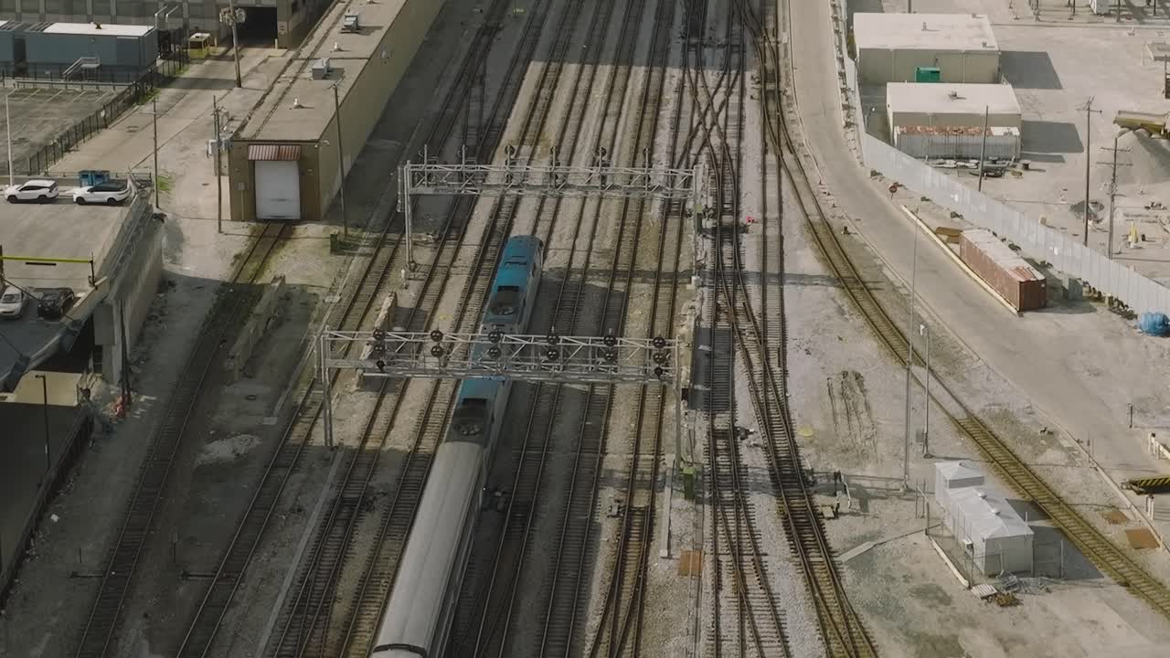 Aerial view of train tracks and rail yard in Chicago during daytime
