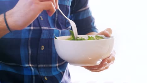 man having breakfast at home 4k