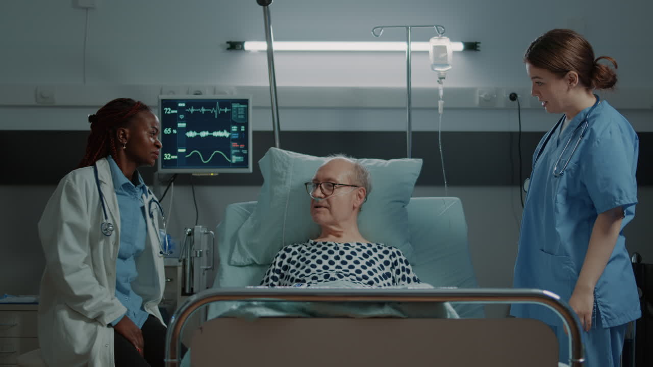 Nurse from hospital ward taking care of sick patient