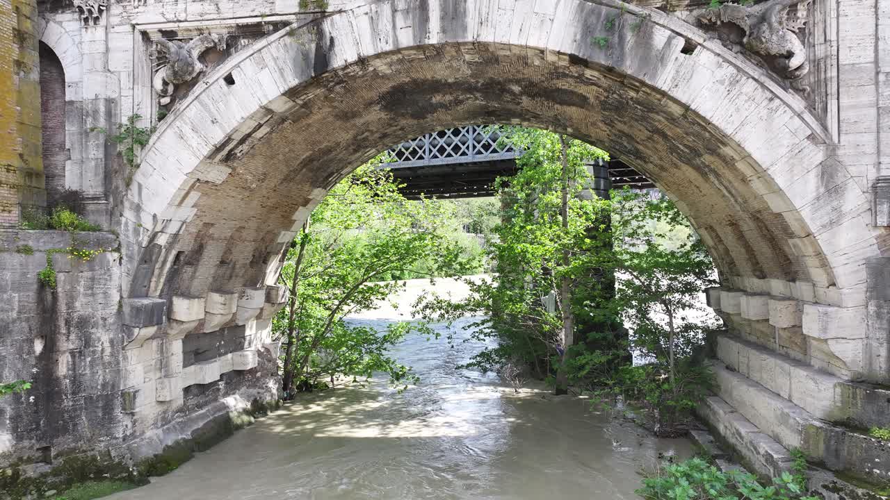 Stone Bridge At Rome In Lazio Italy. Medieval Buildings. Downtown District. Stone Bridge At Rome In Lazio Italy. 2Nd Century Before Christ. Roman Bridge Tiber River. Rome Skyline.