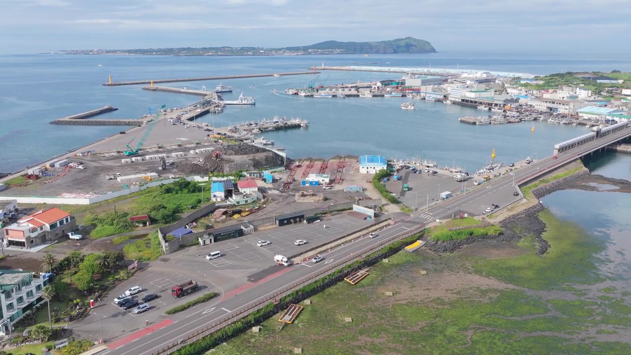 Horizontal cameo shot panning right over Umutgae Coast near Seongsan Ilchulbong, East Jeju, South Korea