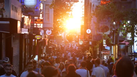 sunset crowded street scene