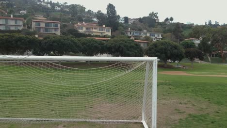 other afternoon drone view short scene above a soccer field and moving forward near the place of magala creek and palos verdes little league, california