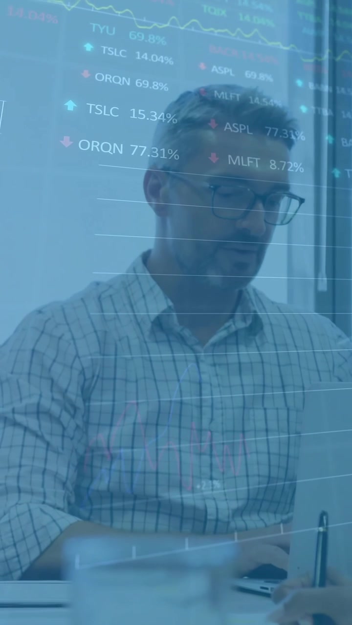 Animation of financial data processing over diverse business people using laptop