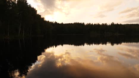 beautiful sunset reflecting on a lake in finland