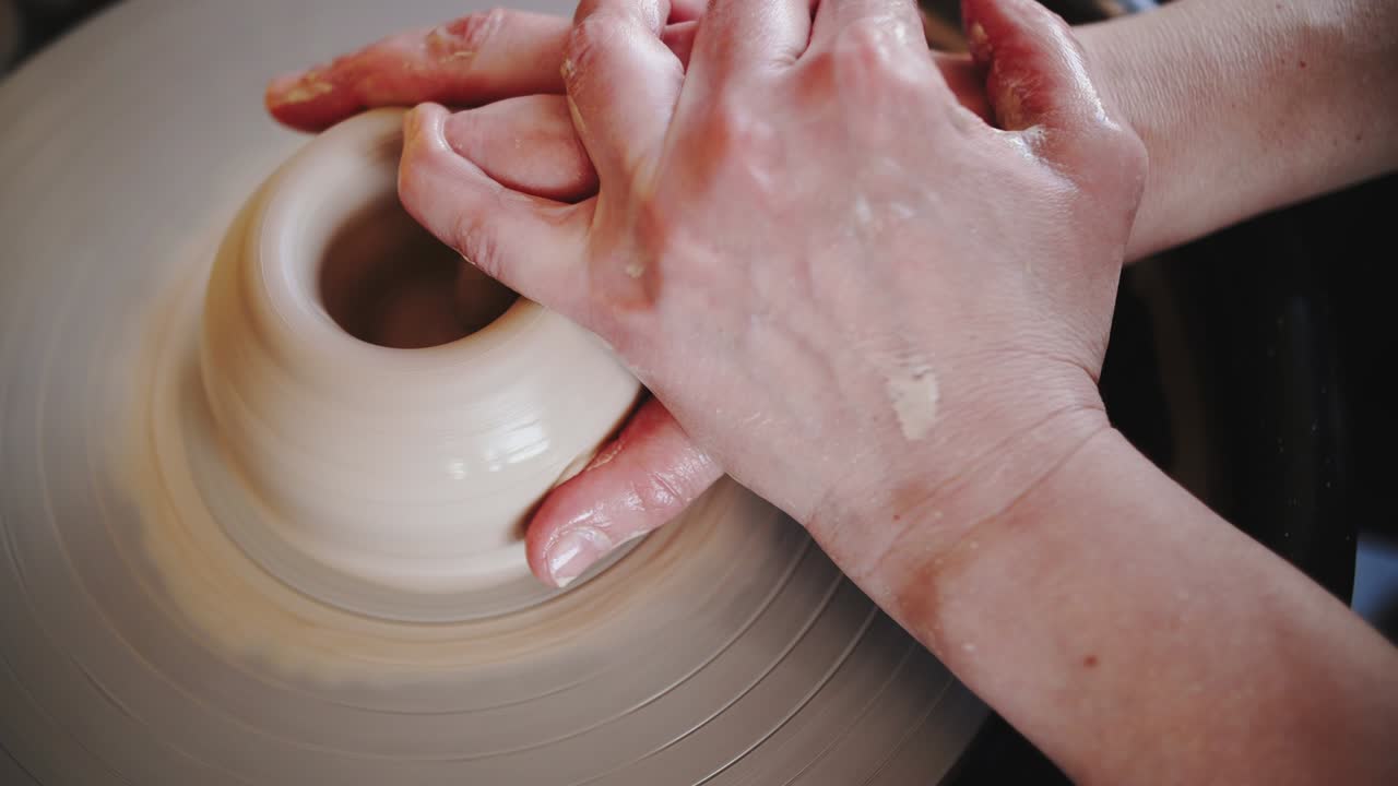 footage of pottery wheel work