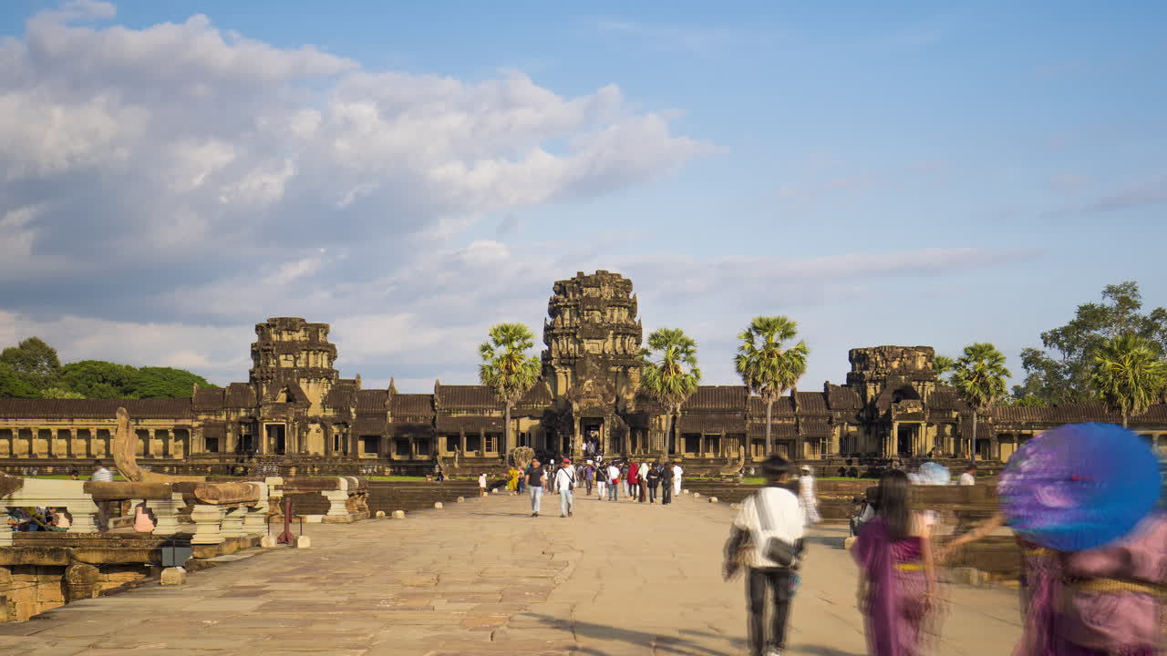 Crowds of tourists entering the Angkor causeway, time lapse, Siem Reap, Cambodia.