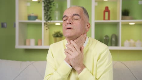 worried and nervous depressed old man at home in a state of depression and panic.