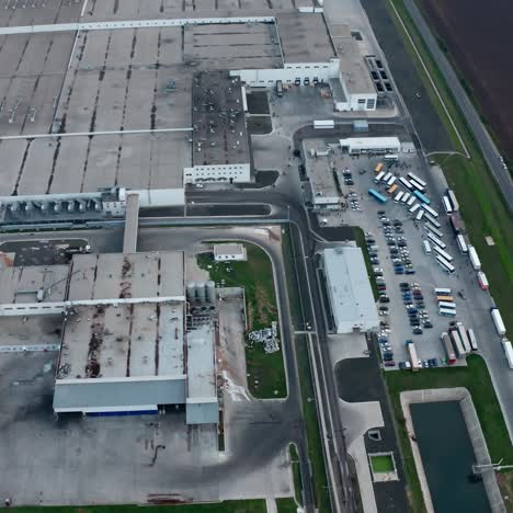 harmful manufacturing among nature. flight over the industrial area. large territory of factory in the countryside. aerial view.