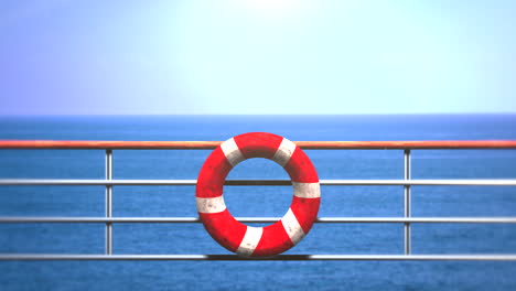 red lifebuoy on ship in ocean