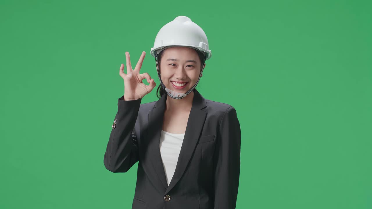Businesswoman Engineer Showing Ok Sign