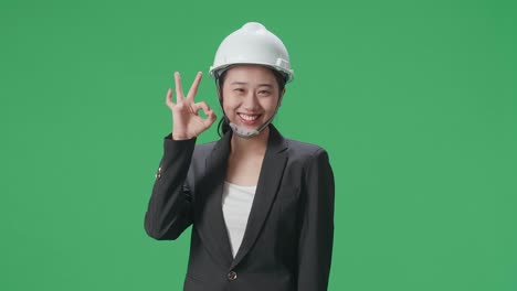 Businesswoman Engineer Showing Ok Sign