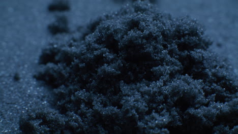 close-up of dark sand