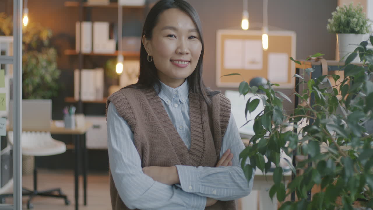 Asian Woman in Modern Office