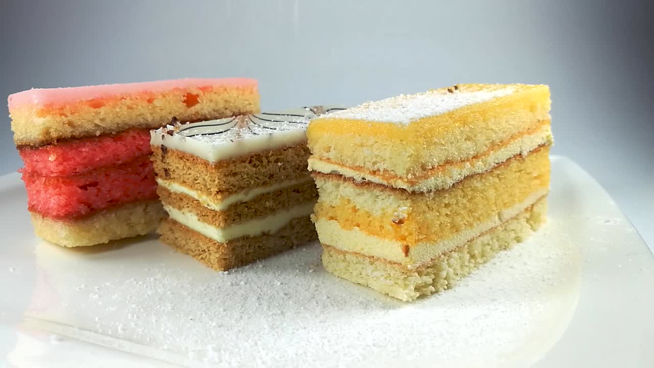 설탕을 입힌 다채로운 케이크 가루, 스틸, 슬로모