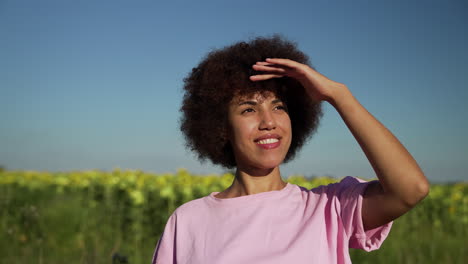 young woman in a sunflower field