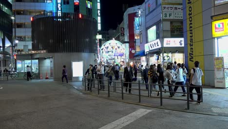 busy night street in tokyo, japan