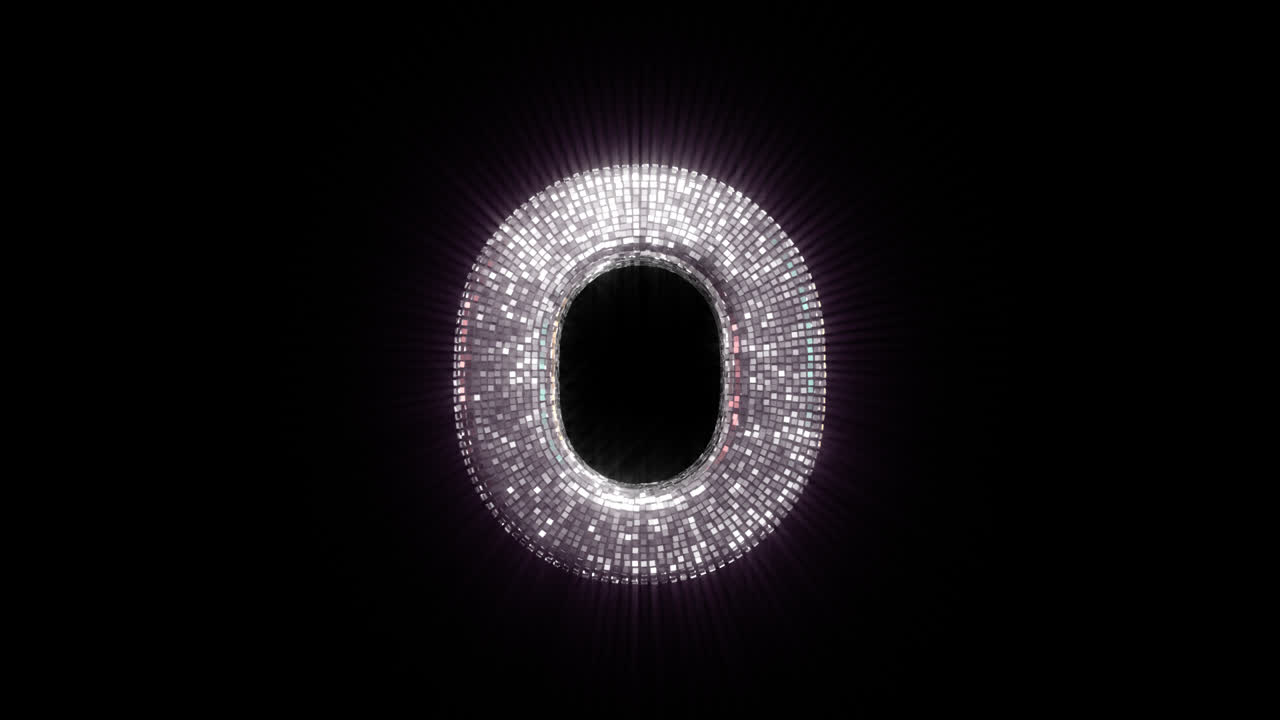 黒い背景に輝くディスコボールの文字「O」