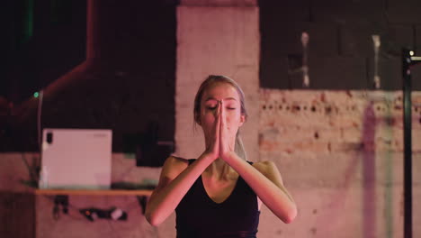 Beautiful-Young-Woman-In-Sportswear-Practicing-Yoga-At-Fitness-Studio-6