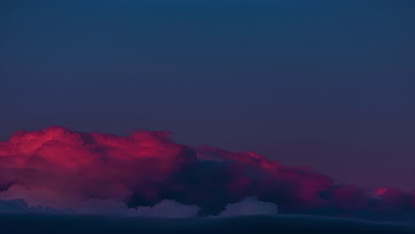 purple and bright red clouds of sunset - time lapse