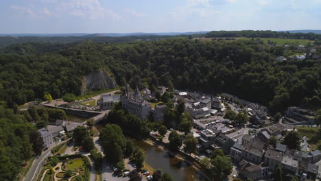 aerial of durbuy city center and rock formation