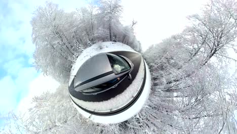 car is driving through winter forest, 360 degree, little planet effect