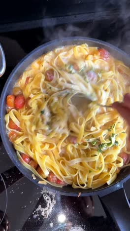 fettuccine alfredo with cherry tomatoes