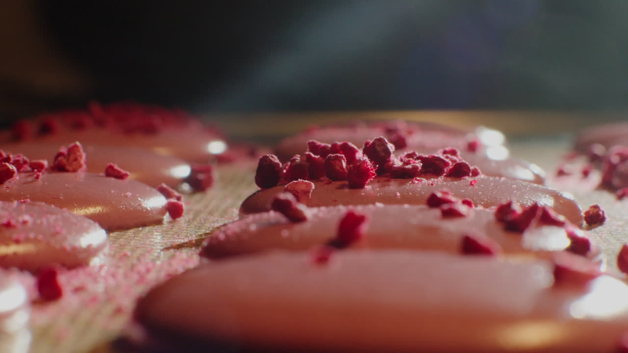 Pink Macarons with Raspberry Topping