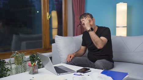 Home-office-worker-man-smiling-at-camera.