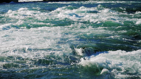 Stormy-Water-In-A-Mountain-River-Viewed-From-Above