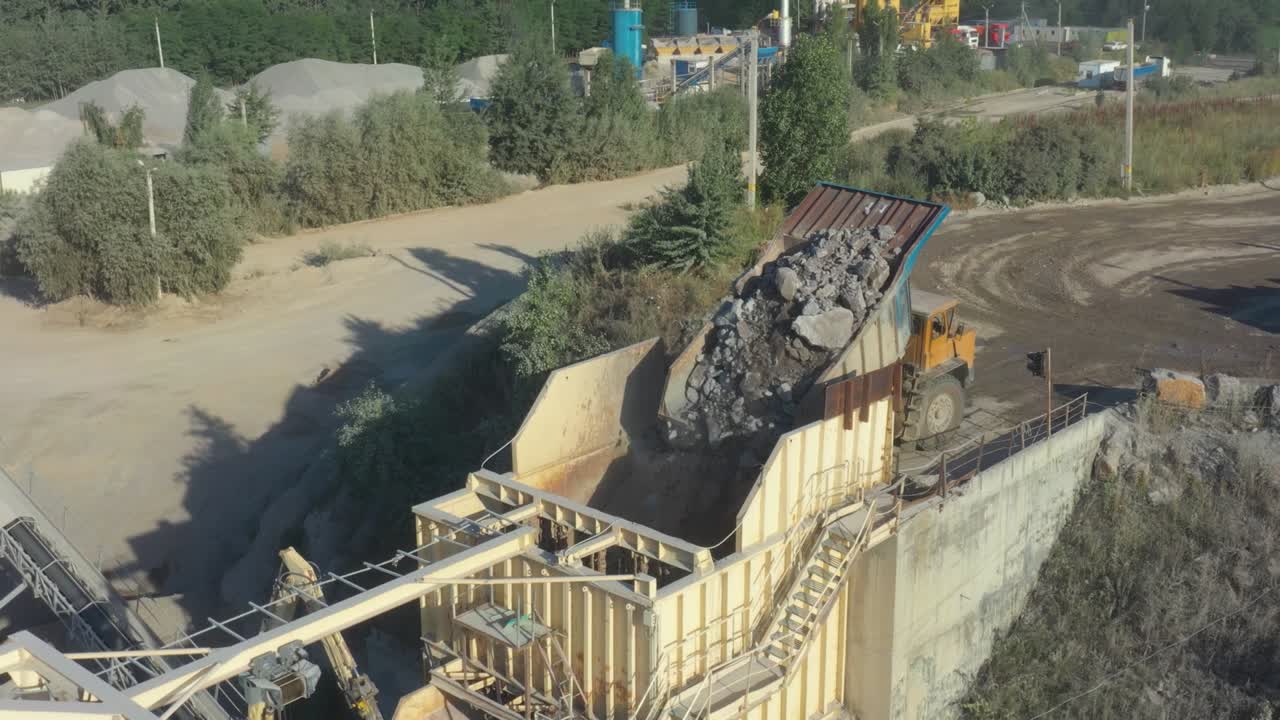 Granite quarry. Extraction of granite. Open cast mine. Stone Quarrying - Aerial view