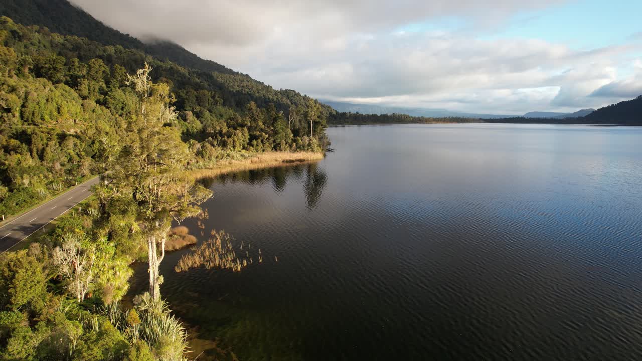 Tranquil Scenery Of Lake Ianthe Matahi During Sunset In South Island, New Zealand - Drone Shot