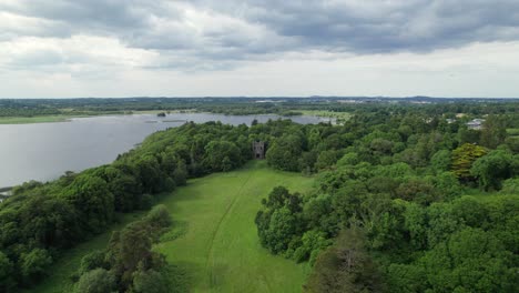 Aerial-view-of-Gothic-Arch-in-Belvedere-House-Gardens,-from-afar