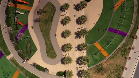 aerial view of a modern urban park with playground