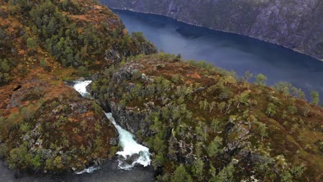 Aerial-of-massive-waterfall-in-the-high-mountains-of-Norway