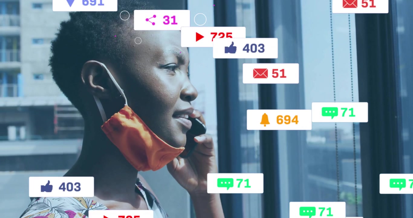 Woman initiating phone call by glass window while icons growing then fading for social media