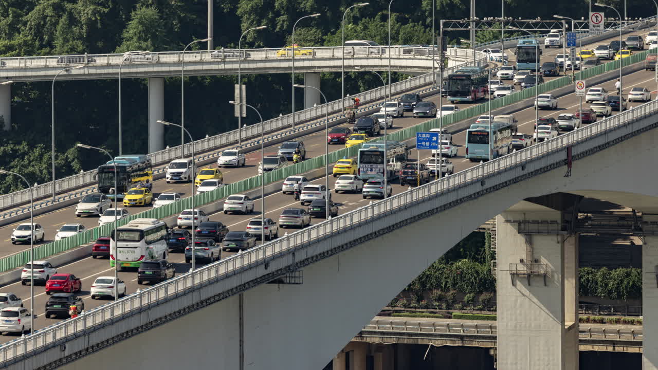 Timelapse of the amazing Chongqing cyberpunk city skyline from a high vantage point wirh the yangtze river