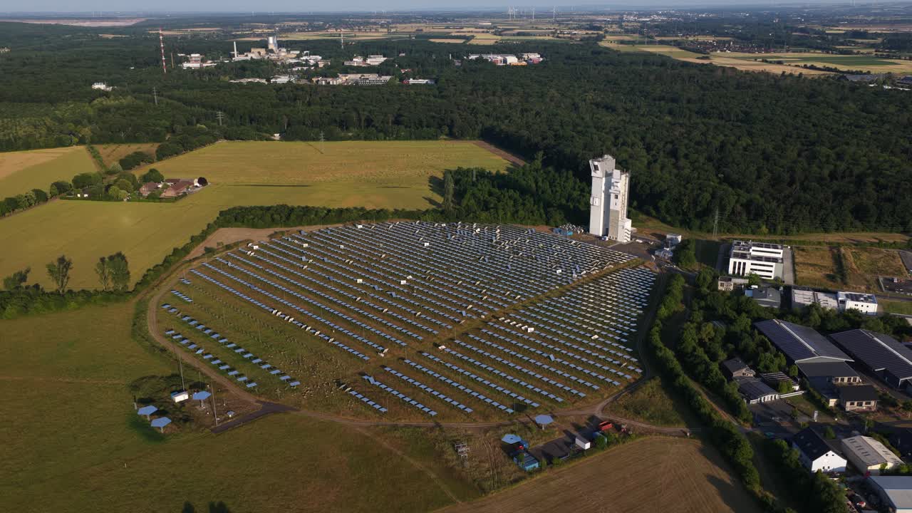 Solar mirrors, soalr park Julich, experimental renewable energy. Aerial drone video.